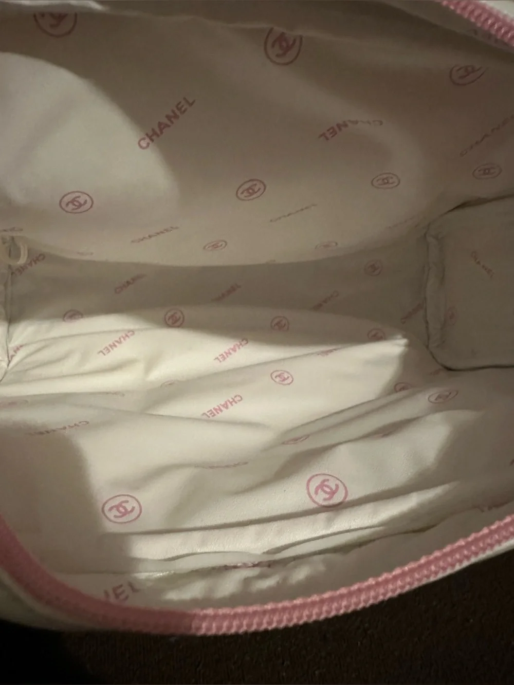 CHANEL White Cosmetic Pouch with Pink Trim. 9.25”W x 7”H.